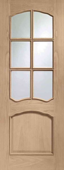 xl joinery riviera pre finished oak internal glazed door with raised mouldings and clear bevelled glass